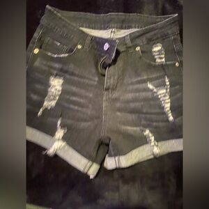 Black shorts size medium. Has stretch.